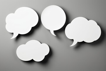 Wall Mural - three white speech bubbles on a gray background with shadows