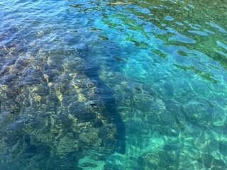 Wall Mural - sea crystal clear emerald blue water.