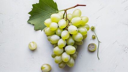 Sticker - Cluster of fresh green grapes with a single leaf on a light textured background highlighting natural freshness and vibrant green colors