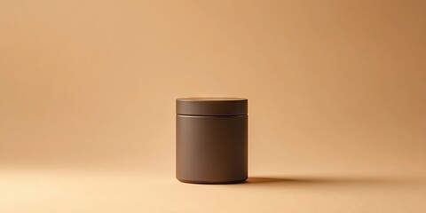 Leinwandbilder - Brown plastic tea container centered on a beige background with soft shadows, highlighting the smooth surface and minimalist design.