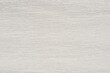 A close-up shot of textured white and gray crepe paper with a subtle, wavy pattern
