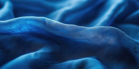 Poster - Flowing translucent blue fabric with soft waves and gentle folds, showcasing varying shades of blue for texture and depth in a close-up composition.