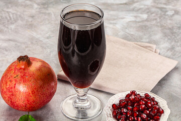 Wall Mural - Sweet fresh pomegranate juice with fruit