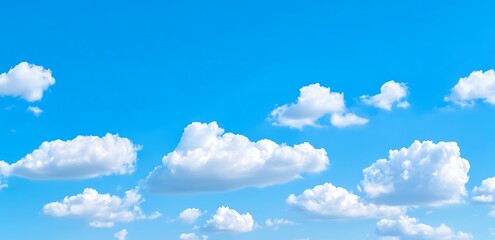 Blue sky with fluffy white clouds