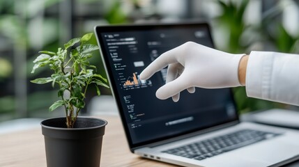 Poster - Hand in White Glove Touching Laptop Screen with Data and Small Plant Nearby