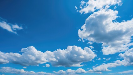 Poster - Vibrant Blue Sky Adorned with Soft White Clouds Creating a Tranquil Natural Landscape