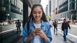 © Arshadul - Smiling Young Woman Using Smartphone in City Modern Urban Lifestyle Happy Technology Mobile Phone Communication Casual Denim Jacket Street Photography Beautiful Asian Woman Digital Device girl apps
