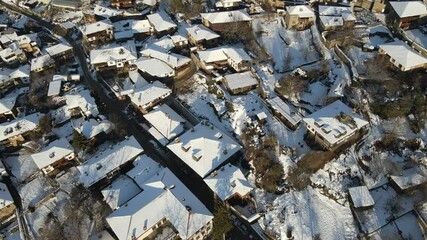 Wall Mural - Aerial Winter Sunset view of Village of Kovachevitsa with Authentic nineteenth century houses, Blagoevgrad Region, Bulgaria