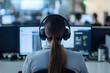 © Muzy Studio - Call Center Employee Wearing Headphones, Providing Customer Support in a Professional Office Environment