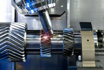 Wall Mural - fastest cnc lathe machine forming cutting the metal gear driven parts. the hi-technology metal worki