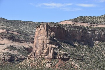 Wall Mural - Striking view of a rocky mesa in Colorado National Monument under a blue sky