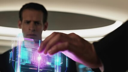 Fototapete - Innovative technology illuminates a modern office as a businessman interacts with a complex, glowing holographic projection, manipulating digital data with a touch