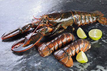 Sticker - Raw lobster, tails and lime on dark table