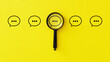 © Andrii - Survey feedback and evaluation feedback. Speech bubble under magnifying lens. Giving opinion on topic of discussion