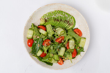 Wall Mural - green salad on the white background