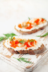 Wall Mural - Toast skagen - shrimps and red caviar on bread. Classic swedish sandwich.