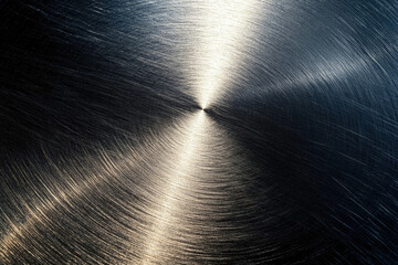 Poster - Circular brushed metal texture with radiating lines, showing light reflection and dark shadows.