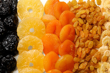 Wall Mural - Different dried fruits on table, top view