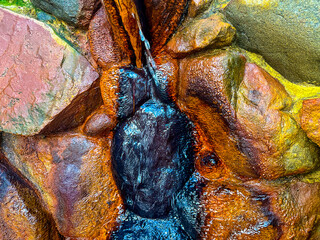 mineral filled spring water colors the stones