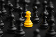© Artificial South - The Golden Pawn: An intriguing macro shot highlights a single, striking yellow pawn amongst a sea of black chess pieces, symbolizing uniqueness and strategic advantage.