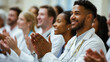© kaliel - Seminar Business Meeting with Doctors and Students Clapping in Hospital Setting