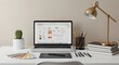 © dreamdes - Designer workspace with laptop displaying ux wireframes, color swatches, and office supplies. Modern creative professional setup for graphic and web design projects.