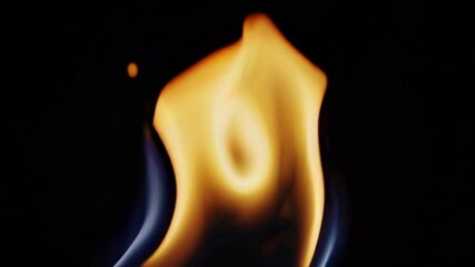 Poster - Flame close-up against dark background with orange and blue hues. Heat and energy concept