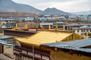 Wall Mural - Beautiful golden roof of Songzanlin Monastery the largest Tibetan Buddhist monastery in Shangri-La town in Yunnan province of China.