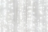 A soft, dreamy background featuring a cascade of white lights against a light backdrop, creating a magical and festive atmosphere.
