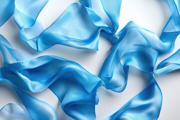Fototapete - Ethereal Blue Silk Fabric Flowing Gracefully on a White Background Capturing Delicate Texture and Lightness for Fashion and Design Projects