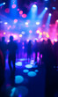 © Lucianastudio - Energetic party atmosphere with vibrant lights and silhouettes of people enjoying music