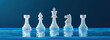 © Chaiwit - Translucent chess pieces arranged on water surface, creating serene atmosphere