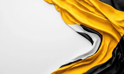 Poster - Elegant draping of a vibrant black, yellow, and white fabric creating a striking visual effect
