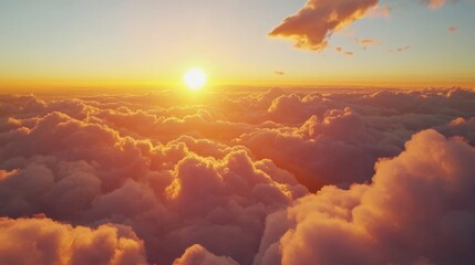 Wall Mural - Golden sunset above fluffy clouds with vibrant sky colors