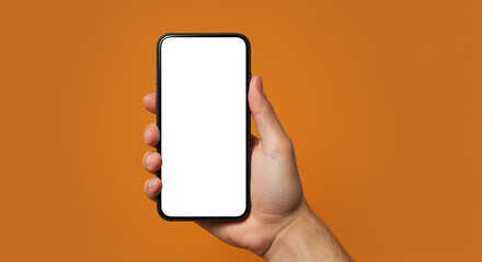Poster - Smartphone in Hand Mockup. Hand holding smartphone with blank screen on orange background. Smartphone mockup in hand