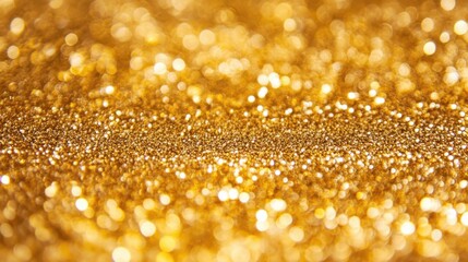 Wall Mural - Golden glittering bokeh background featuring shimmering sparkles and defocused circles ideal for festive designs and elegant presentations

