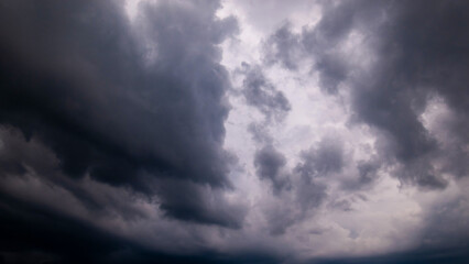 Wall Mural - dark sky with stormy clouds. dramatic sky rain,dark clouds before a thunder-storm.