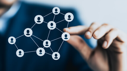 Poster - Human Network: A close-up shot depicts a person holding a network of interconnected people, embodying the essence of human connection and collaboration. This image symbolizes the power of networking.