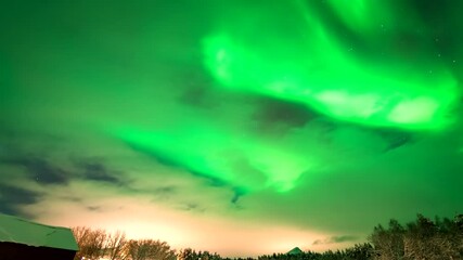 Wall Mural - Vivid green aurora borealis swirl across night sky, mesmerizing celestial display. Perfect for nature and astronomy themes. Time-lapse, copy-space