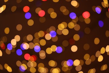 Sticker - Blurred view of colorful lights on dark background, bokeh effect