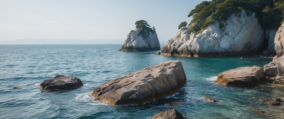 Poster - coastal landscape with rocky outcrops and clear blue sea under a sunny sky