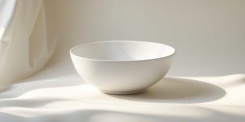 Poster - minimalist white bowl on soft fabric surface with empty space for text or design ideas