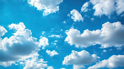 a bright blue sky with fluffy white clouds forming fun, playful shapes.