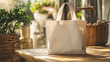 © Yuwarin - A blank white tote bag on a wooden table