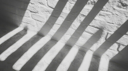 Poster - Shadow patterns on old brick wall with white stucco for architectural design