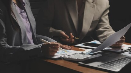 Wall Mural - Arab businessman and woman meeting about office work, close up hands of team discussing something in office, business team concept