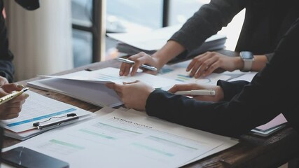 Wall Mural - Arab businessman and woman meeting about office work, close up hands of team discussing something in office, business team concept