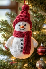 Wall Mural - knitted snowman ornament on christmas tree
