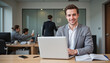 © Iryna - Businessman attending virtual training session at corporate workspace with laptop