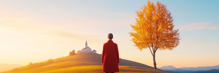 Poster - Minimalist Landscape Art Woman in Vibrant Red Coat at Golden Hour with Autumn Tree - Contemporary for Modern Decor and Visual Storytelling